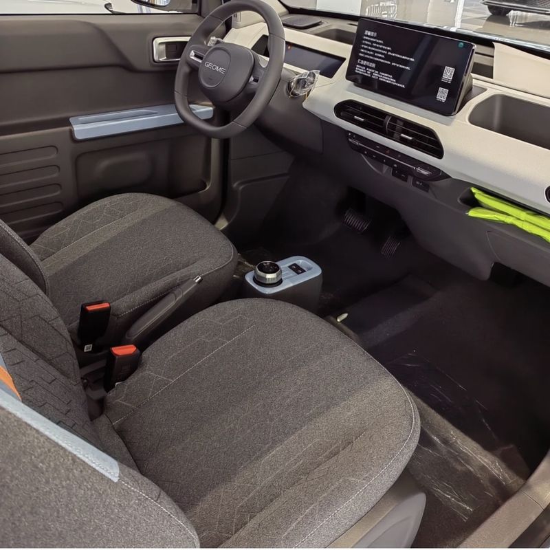 s Geely EV Mini Solar Car with 4 Seats Euro II Emission Standard and 360° Rear Camera